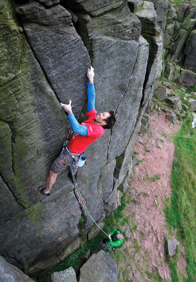 Described as criminally under-graded in the BMC guidebook this statement isn't far from the truth – it's nails. Mike Hutton dips into his reserves on Pod Crack (E1 5c). Photo: © David Simmonite